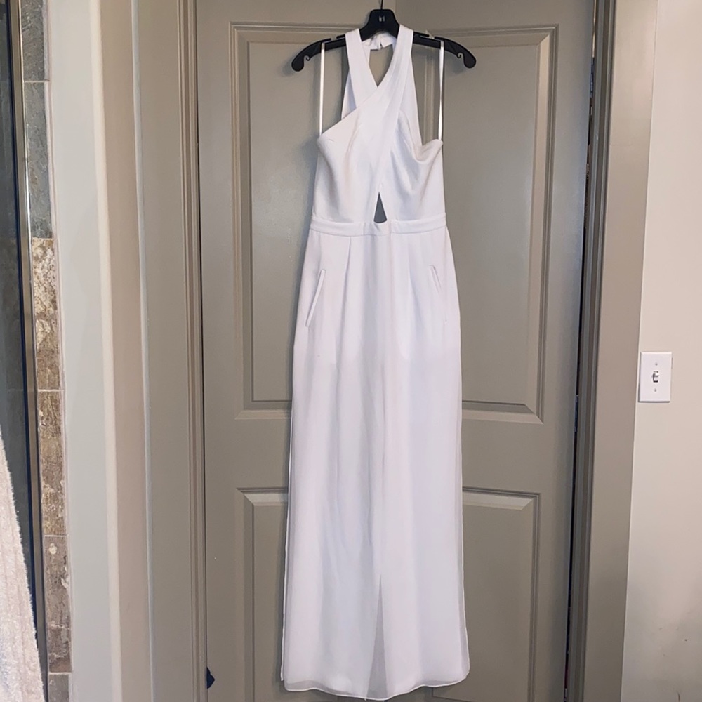 Perfect white jumpsuit with skirt overlay!